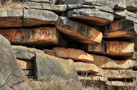 A painting predicting the beginning of winter painted on a rock bluff in Texas