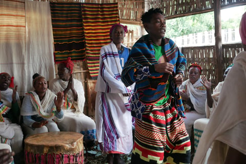 Villagers from the Dorze tribe perform a traditional dance